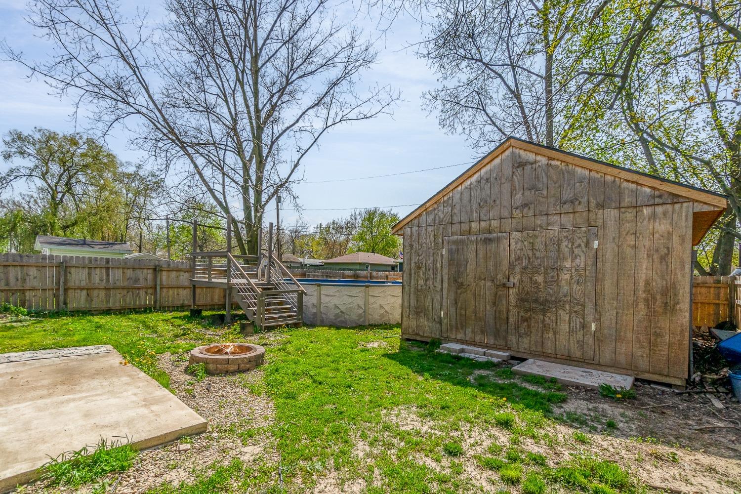 704-3 Juniper Road Valparaiso, IN 46385 - Photo 23 of 24 a backyard of a house with lots of green space