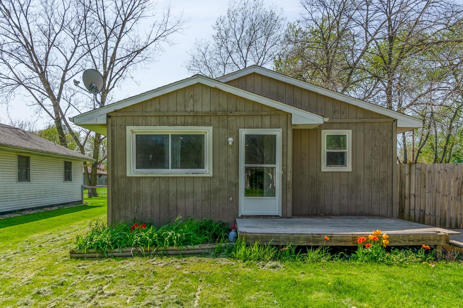 704-3 Juniper Road Valparaiso, IN 46385 - Photo 3 of 24 a view of a small house with a yard