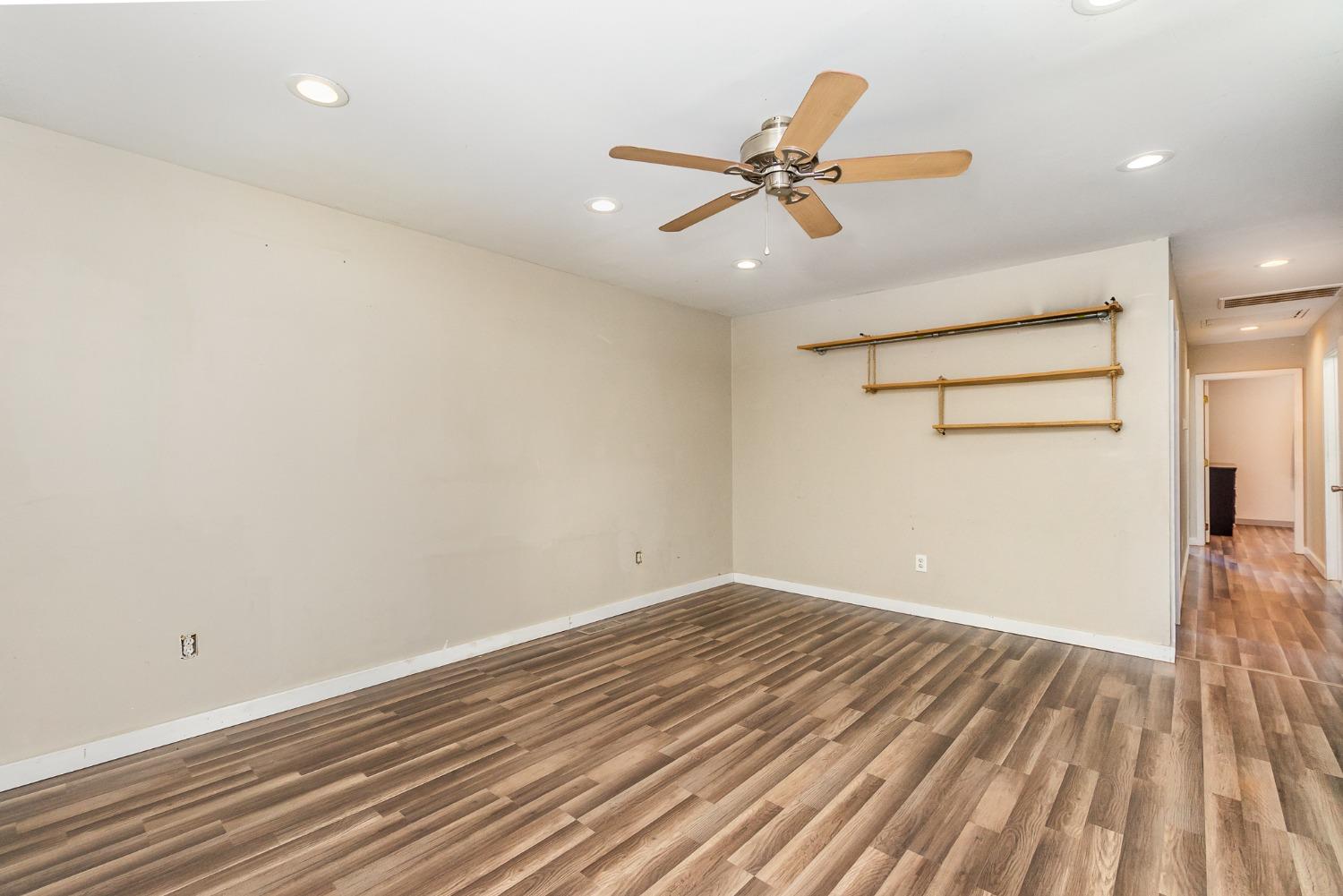 704-3 Juniper Road Valparaiso, IN 46385 - Photo 4 of 24 wooden floor in an empty room with a window