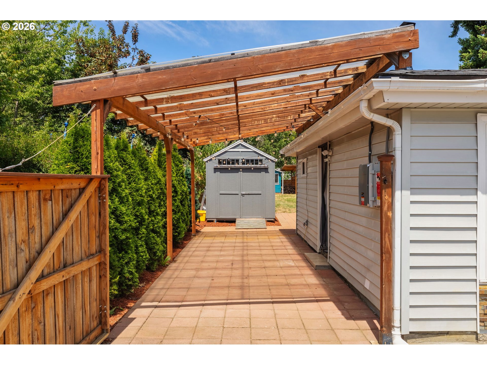 10245 Southeast Raymond Street Portland, OR 97266 - Photo 17 of 25 a view of a patio with wooden floor