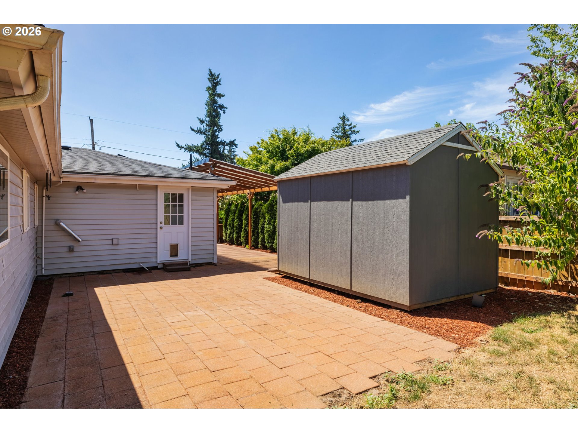 10245 Southeast Raymond Street Portland, OR 97266 - Photo 21 of 25 a backyard of a house