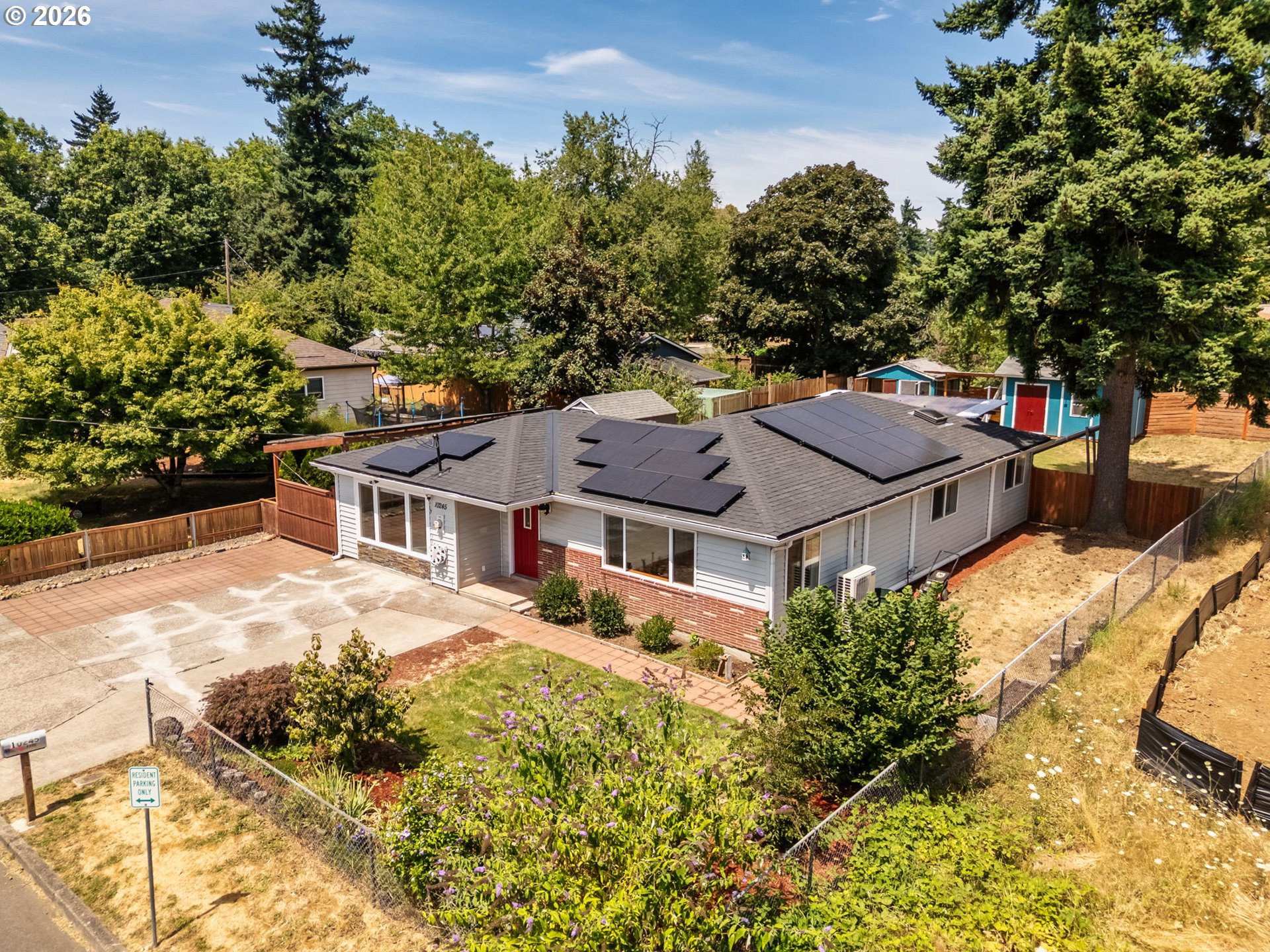 10245 Southeast Raymond Street Portland, OR 97266 - Photo 23 of 25 front view of a house with a yard