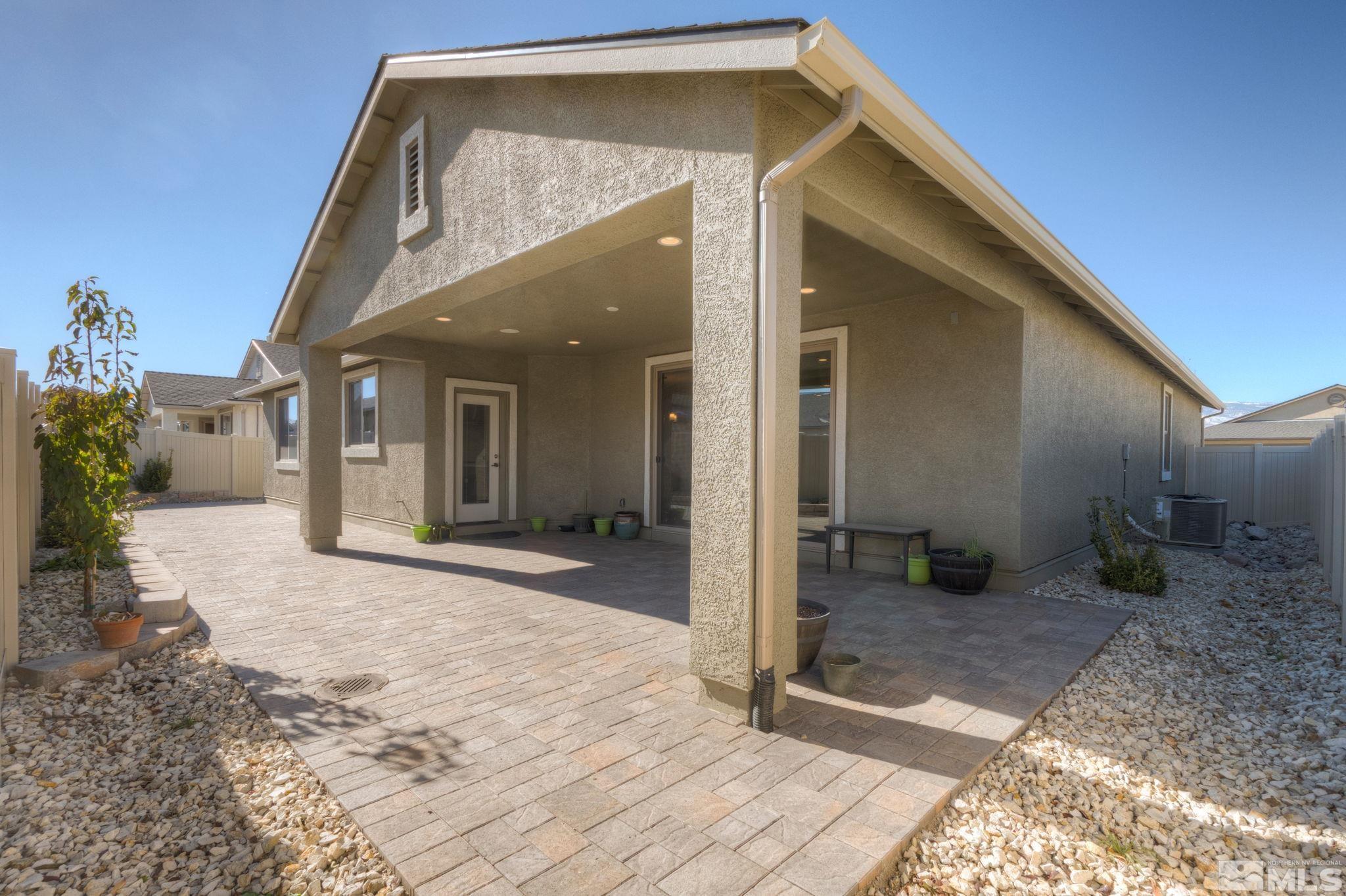 607 Riverbed Circle Reno, NV 89521 - Photo 31 of 40 a view of a big room with a garage