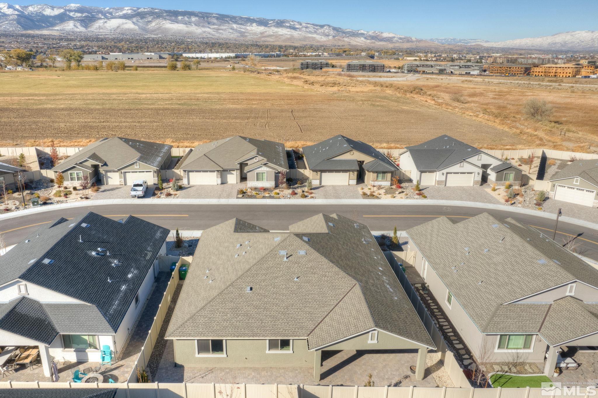 607 Riverbed Circle Reno, NV 89521 - Photo 37 of 40 an aerial view of residential houses with outdoor space and ocean view