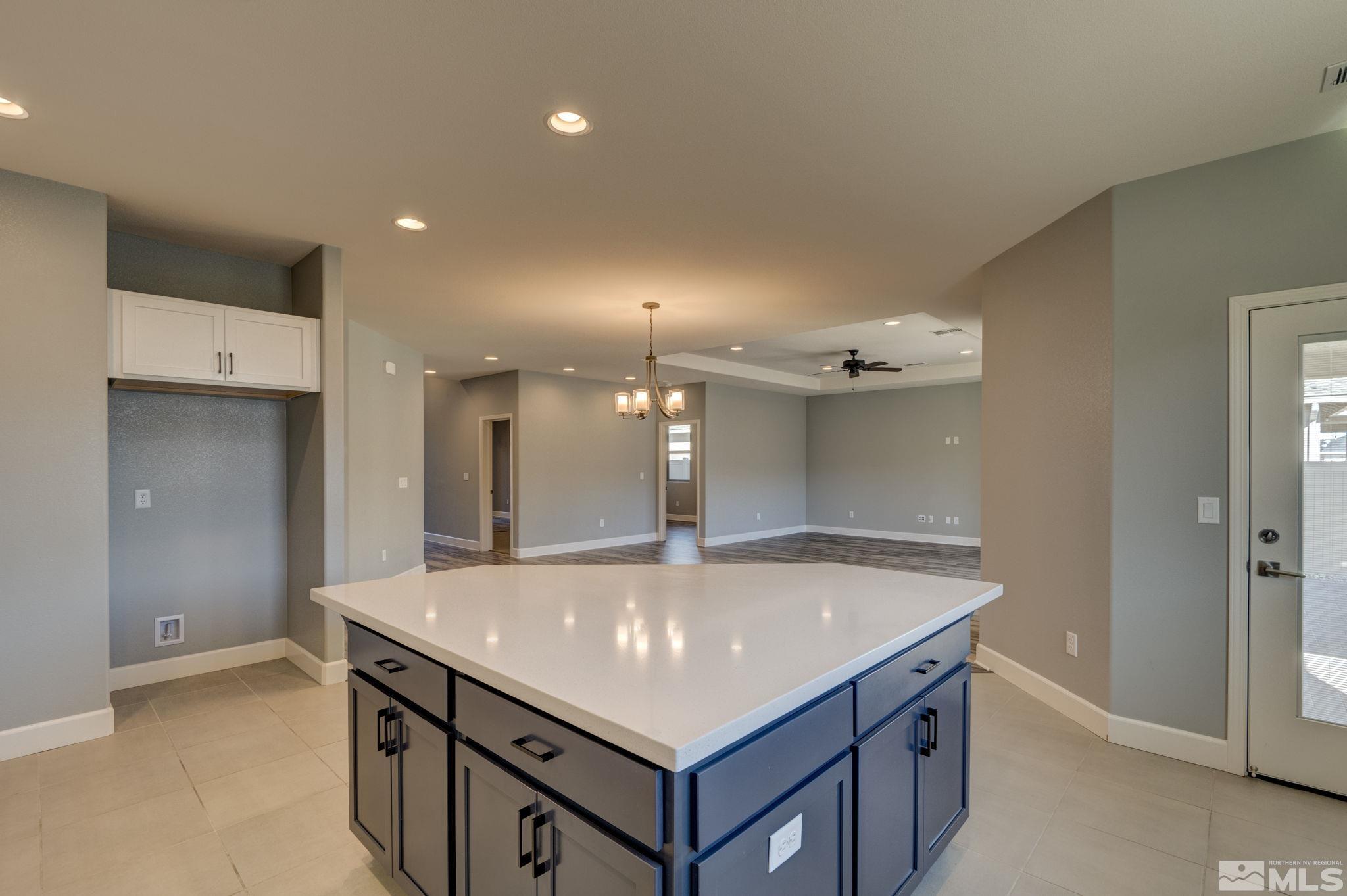 607 Riverbed Circle Reno, NV 89521 - Photo 10 of 40 a bathroom with a sink and a mirror