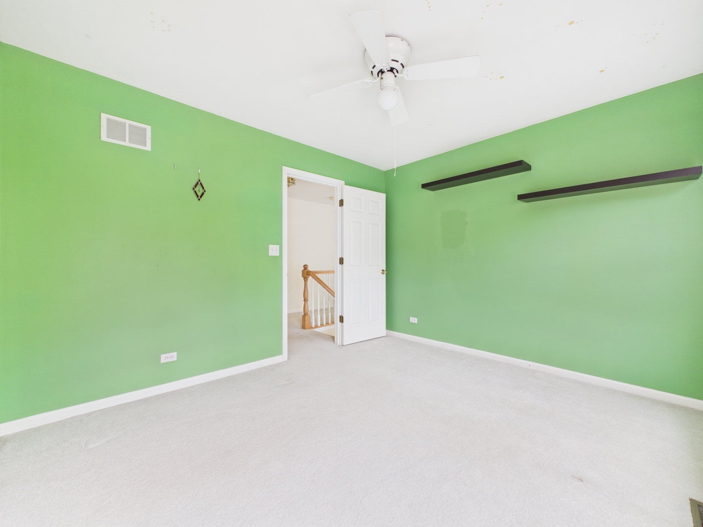 7486 Abbey Road Gurnee, IL 60031 - Photo 27 of 35 a view of a big room with a fan