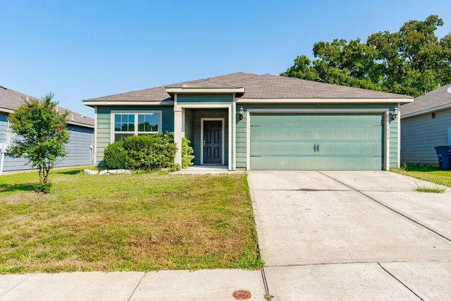 a view of outdoor space yard and front view of a house