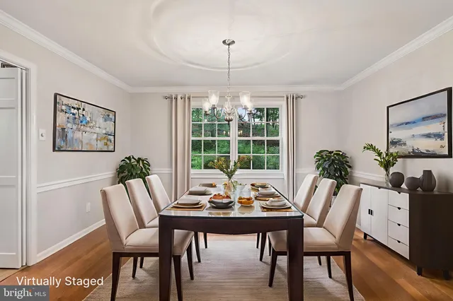 a view of a room with furniture and window