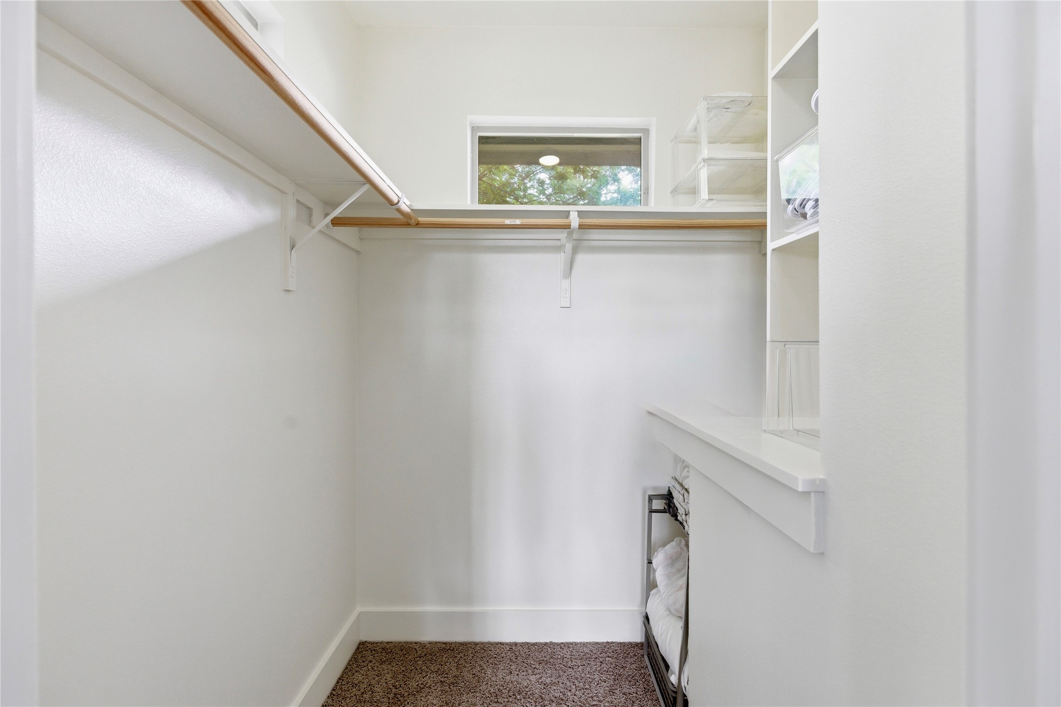 2202 Willow Street, Unit B Austin, TX 78702 - Photo 11 of 21 Walk in closet featuring dark carpet
