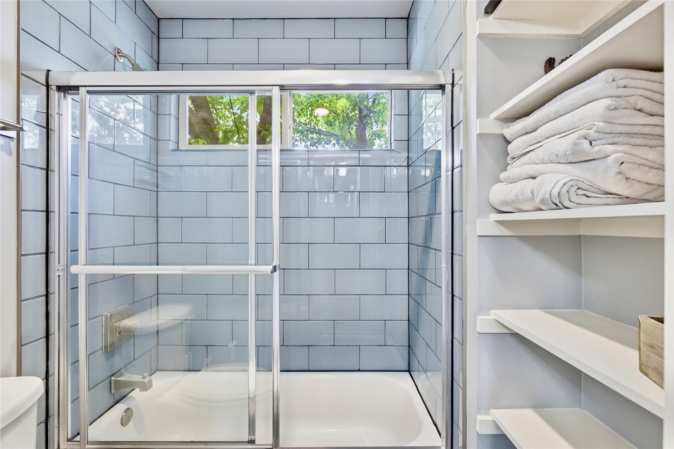 2202 Willow Street, Unit B Austin, TX 78702 - Photo 13 of 21 Bathroom featuring bath / shower combo with glass door and toilet