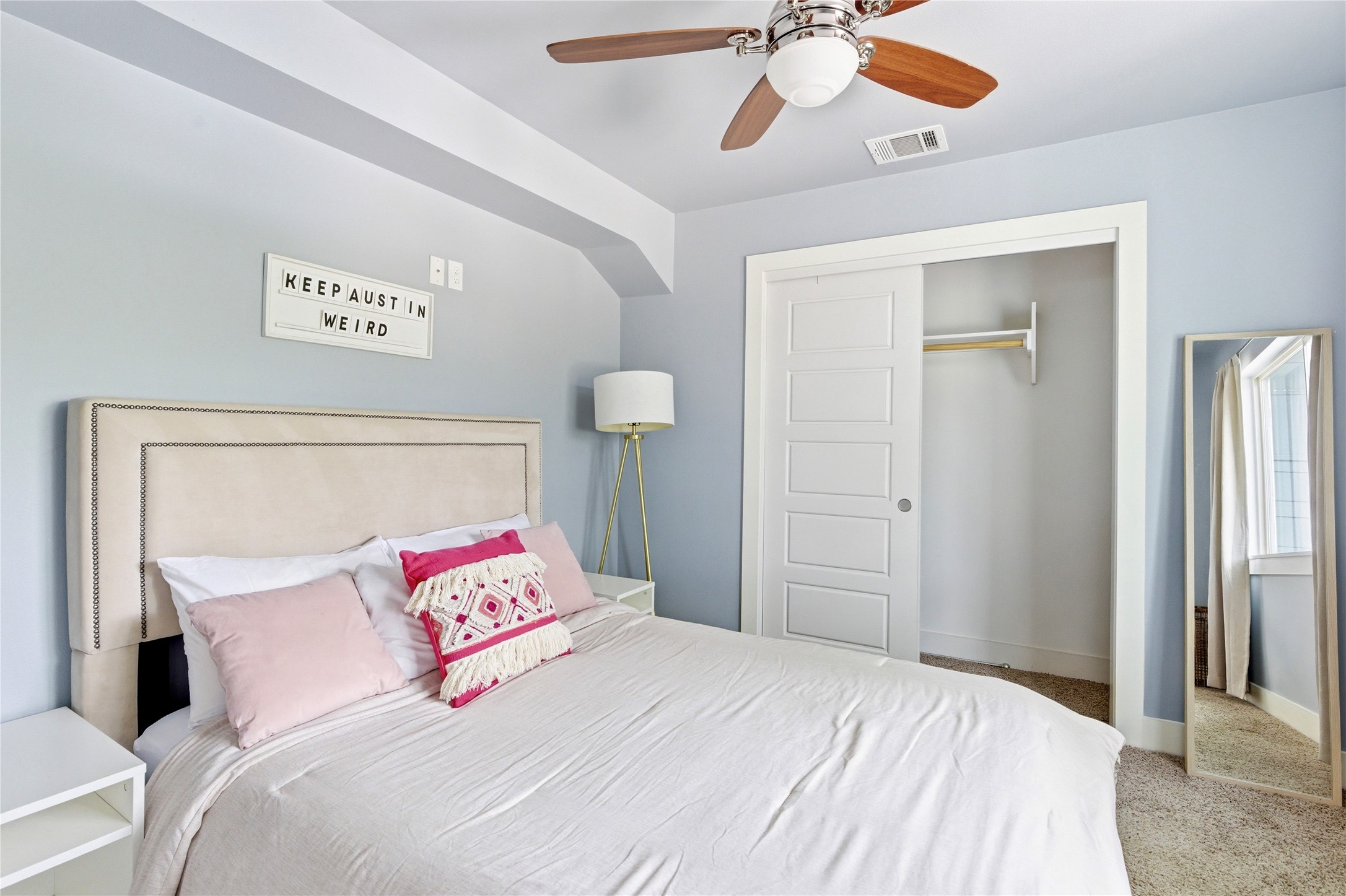 2202 Willow Street, Unit B Austin, TX 78702 - Photo 14 of 21 Bedroom with carpet flooring, a closet, and ceiling fan