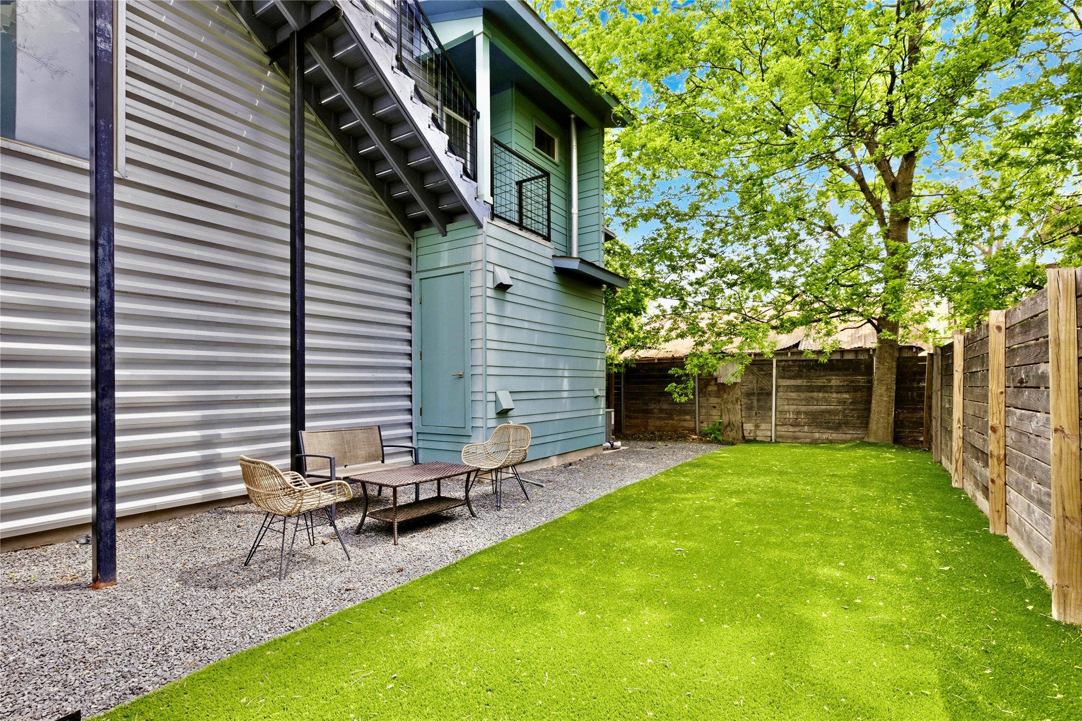 2202 Willow Street, Unit B Austin, TX 78702 - Photo 17 of 21 Fenced backyard with a patio area and a balcony