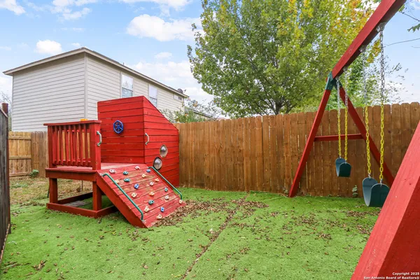 a backyard of a house with seating space