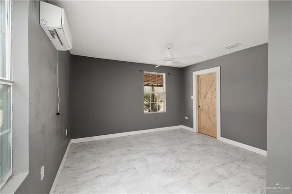 an empty room with windows