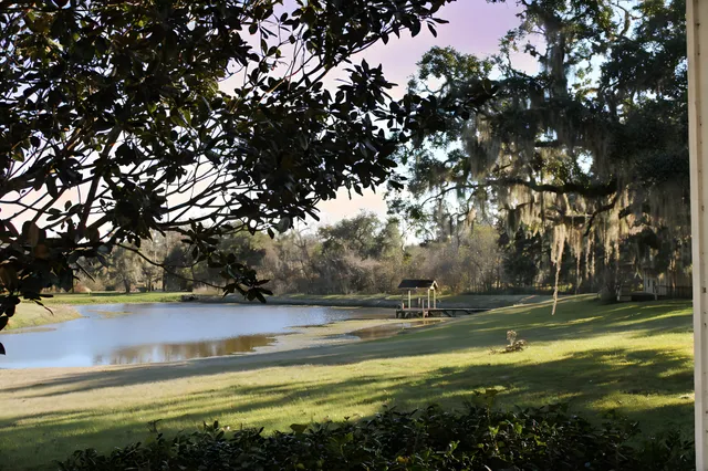 a view of a swimming pool with an outdoor space and seating area