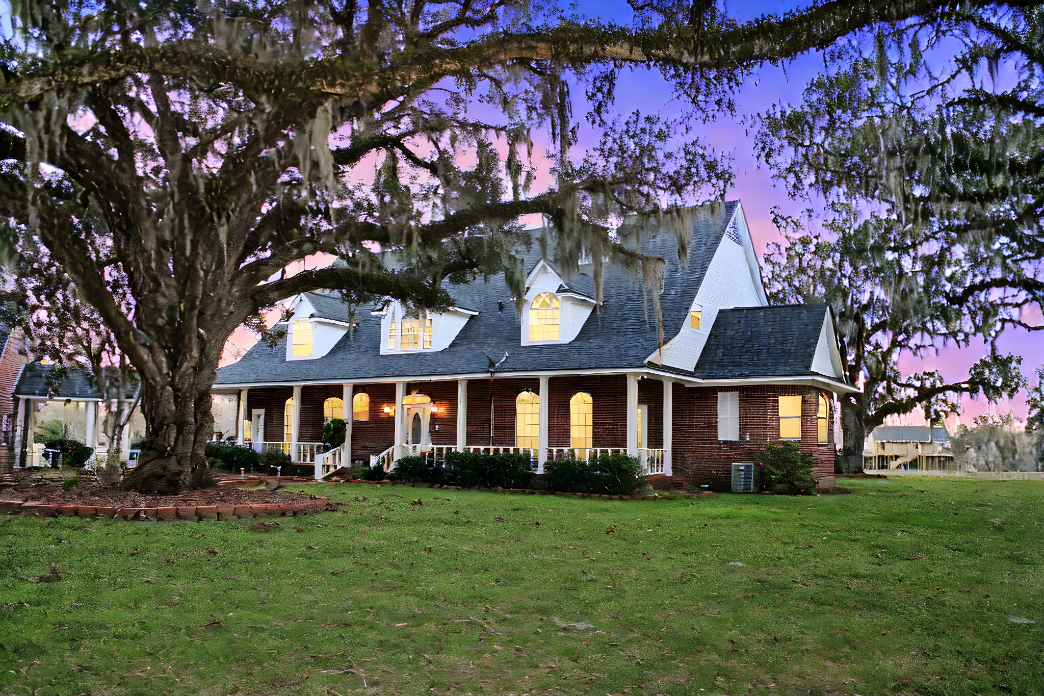7850 County Road 684 Sweeny, TX 77480 - Photo 2 of 10 a front view of a house with a garden
