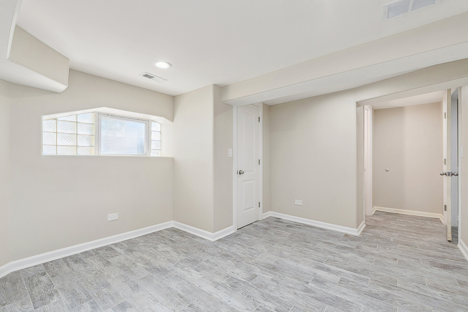 9400 South Charles Street Chicago, IL 60643 - Photo 22 of 30 a view of an empty room with wooden floor and a window