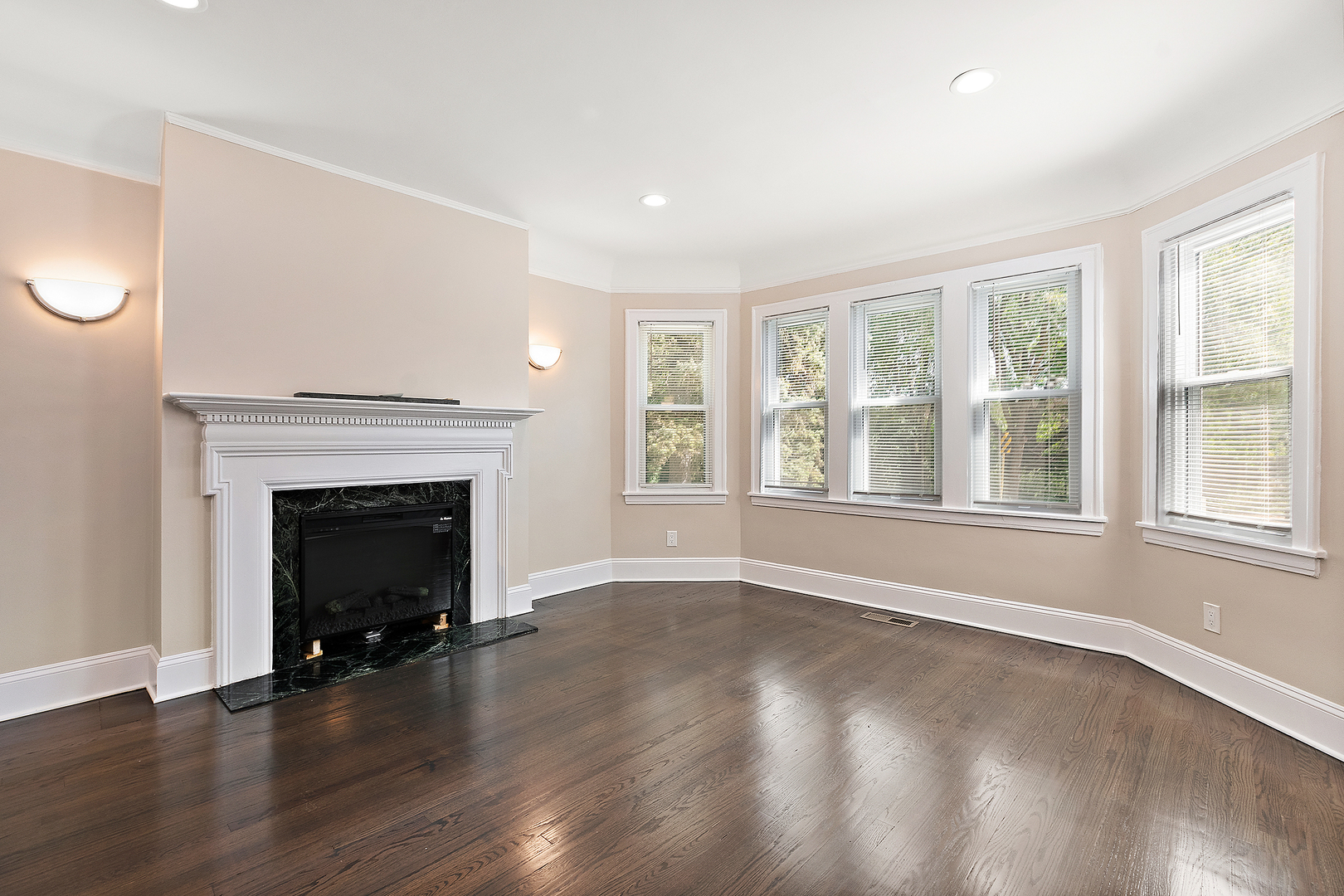 9400 South Charles Street Chicago, IL 60643 - Photo 4 of 30 a living room with a fireplace and wooden floor