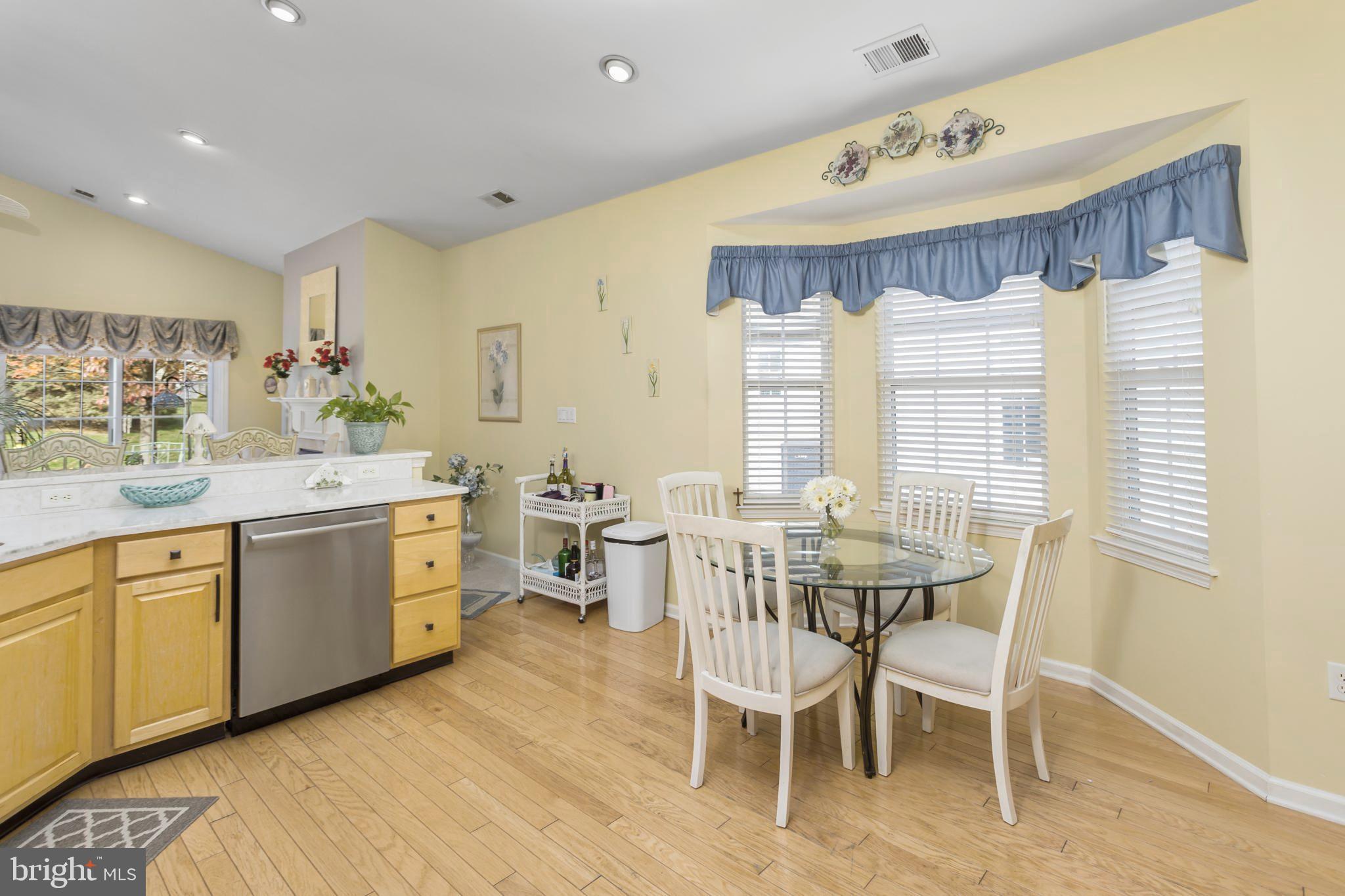 10 Powderhorn Way Allentown, NJ 08501 - Photo 13 of 42 a kitchen with a sink stove and cabinets