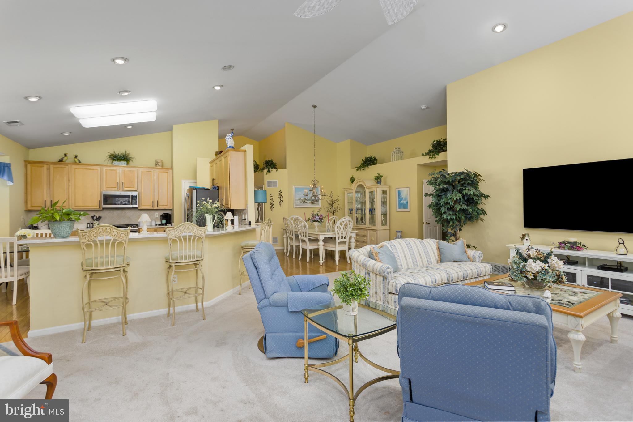 10 Powderhorn Way Allentown, NJ 08501 - Photo 13 of 44 a living room with fireplace furniture and a flat screen tv