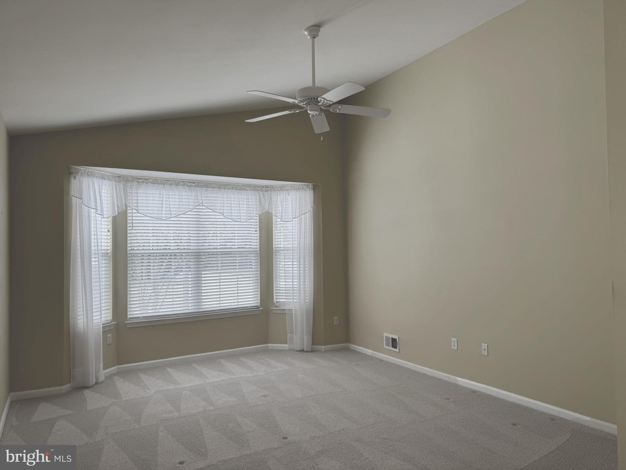 10 Powderhorn Way Allentown, NJ 08501 - Photo 15 of 42 an empty room with a empty space and windows