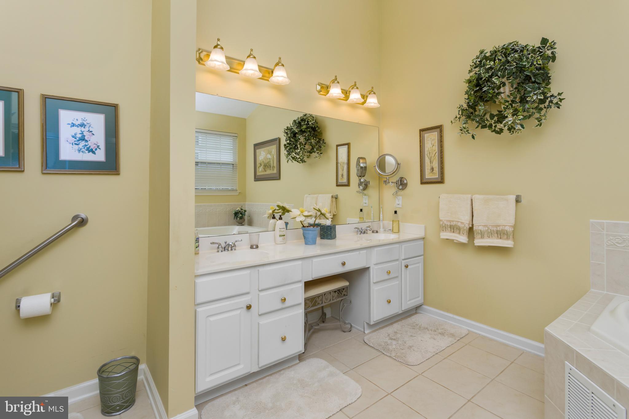 10 Powderhorn Way Allentown, NJ 08501 - Photo 18 of 44 a spacious bathroom with a double vanity sink mirror and toilet