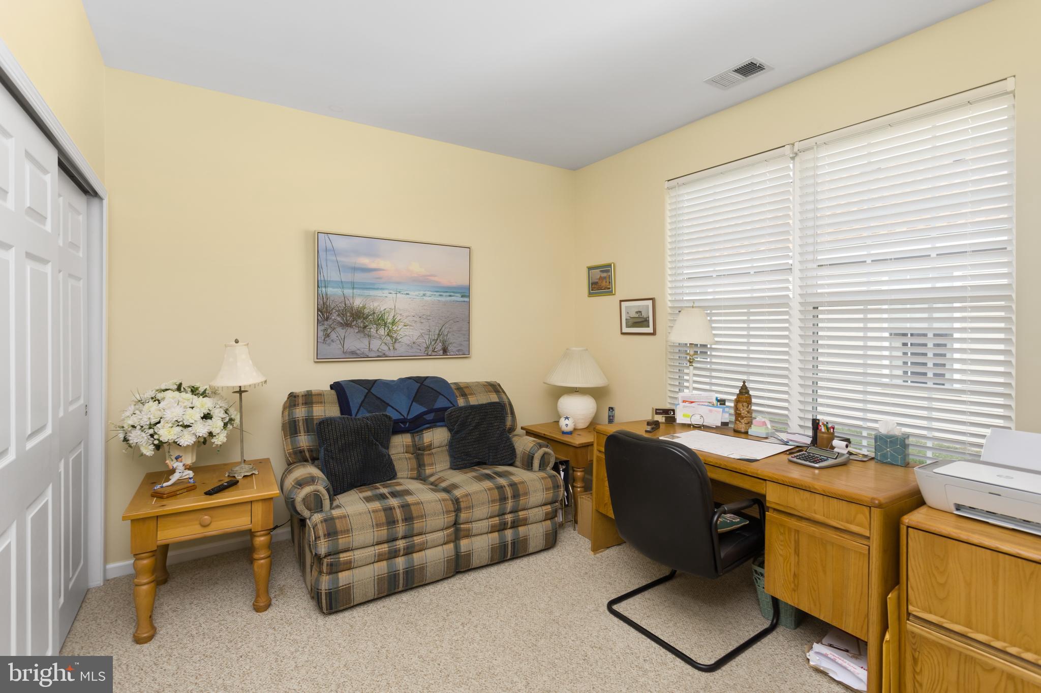 10 Powderhorn Way Allentown, NJ 08501 - Photo 22 of 44 a living room with furniture and a window