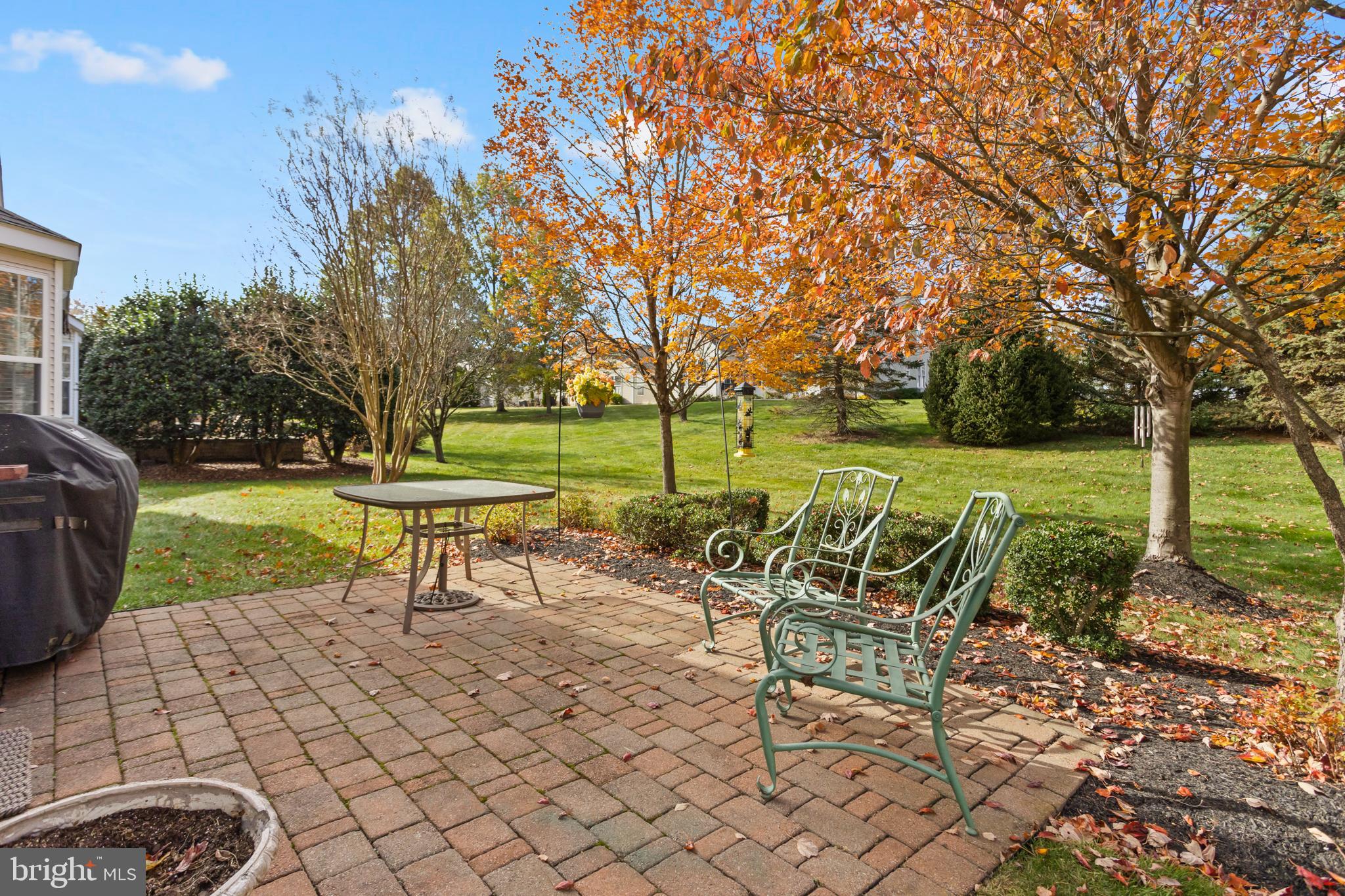10 Powderhorn Way Allentown, NJ 08501 - Photo 23 of 42 a view of a park with bench and trees in a park