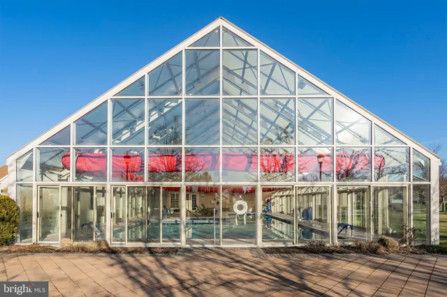 a view of swimming pool with a patio