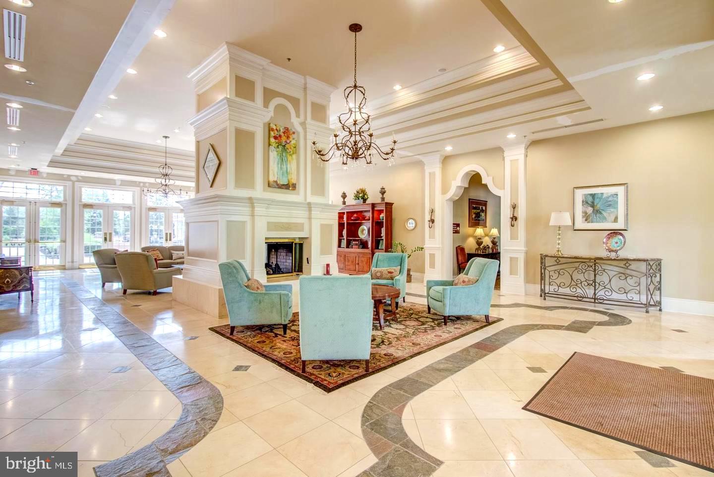 10 Powderhorn Way Allentown, NJ 08501 - Photo 39 of 44 a living room with fireplace furniture and a chandelier