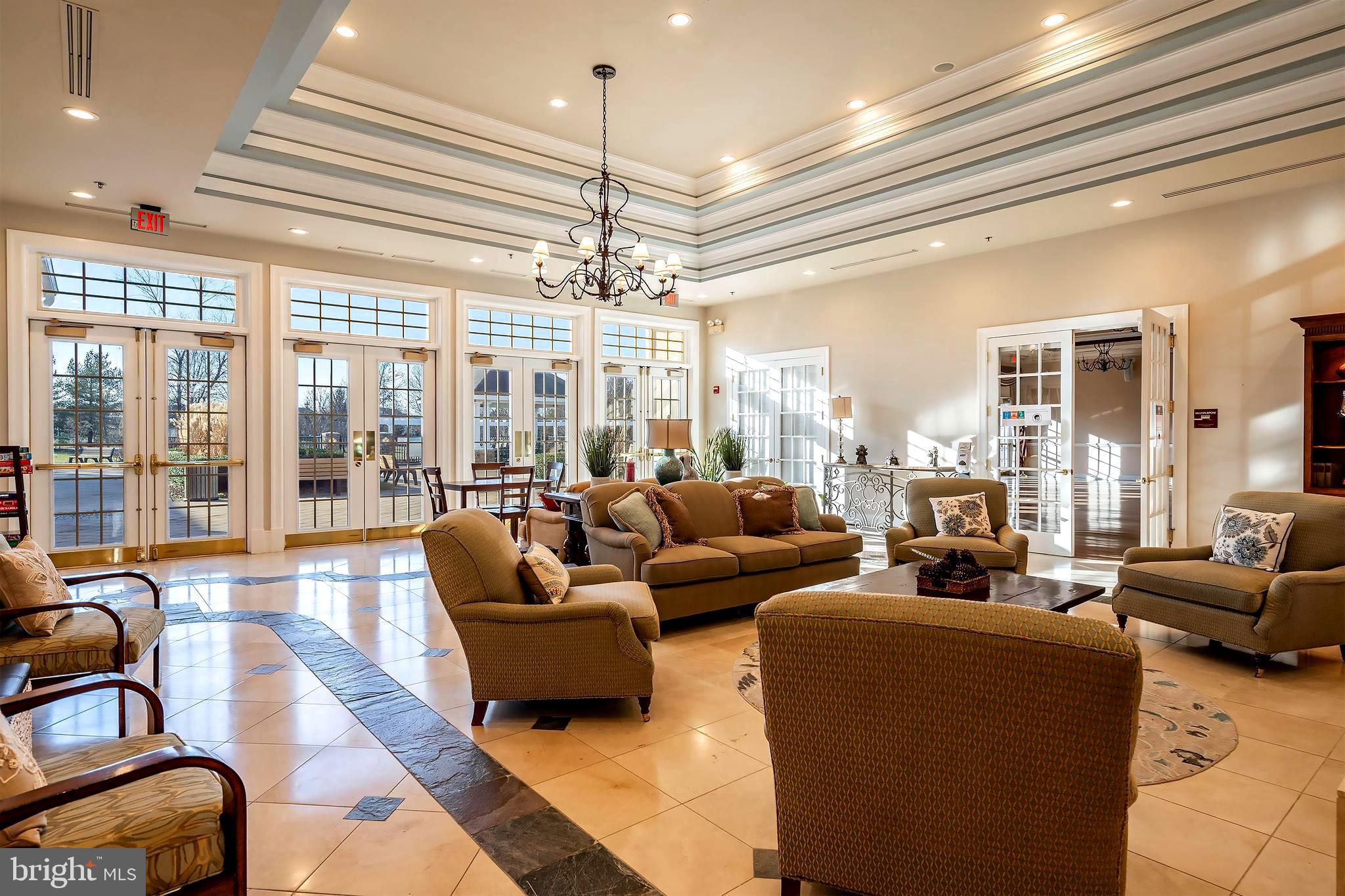 10 Powderhorn Way Allentown, NJ 08501 - Photo 40 of 44 a living room with furniture and a chandelier