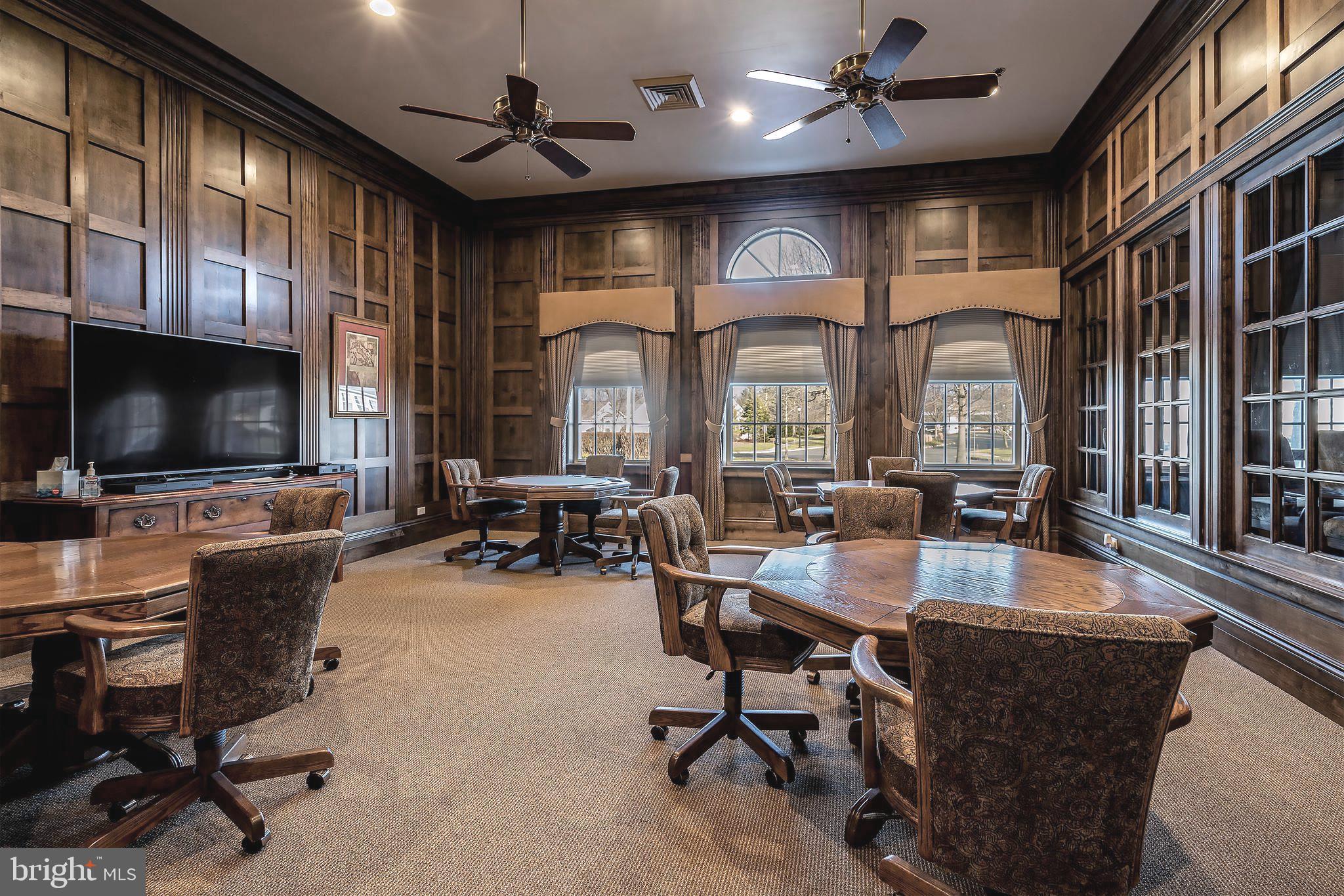 10 Powderhorn Way Allentown, NJ 08501 - Photo 41 of 44 a living room with fireplace furniture and a flat screen tv
