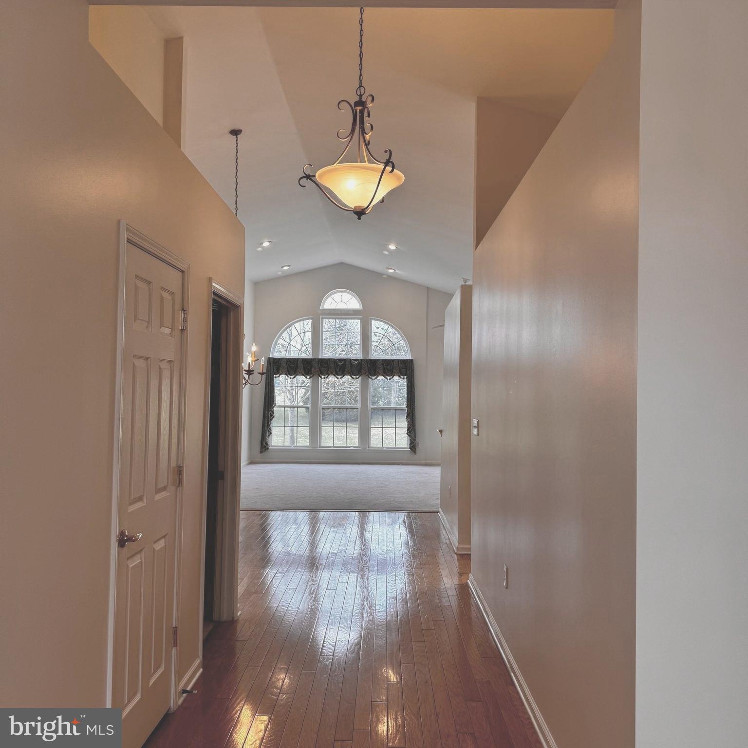10 Powderhorn Way Allentown, NJ 08501 - Photo 5 of 42 a view of an entryway with wooden floor