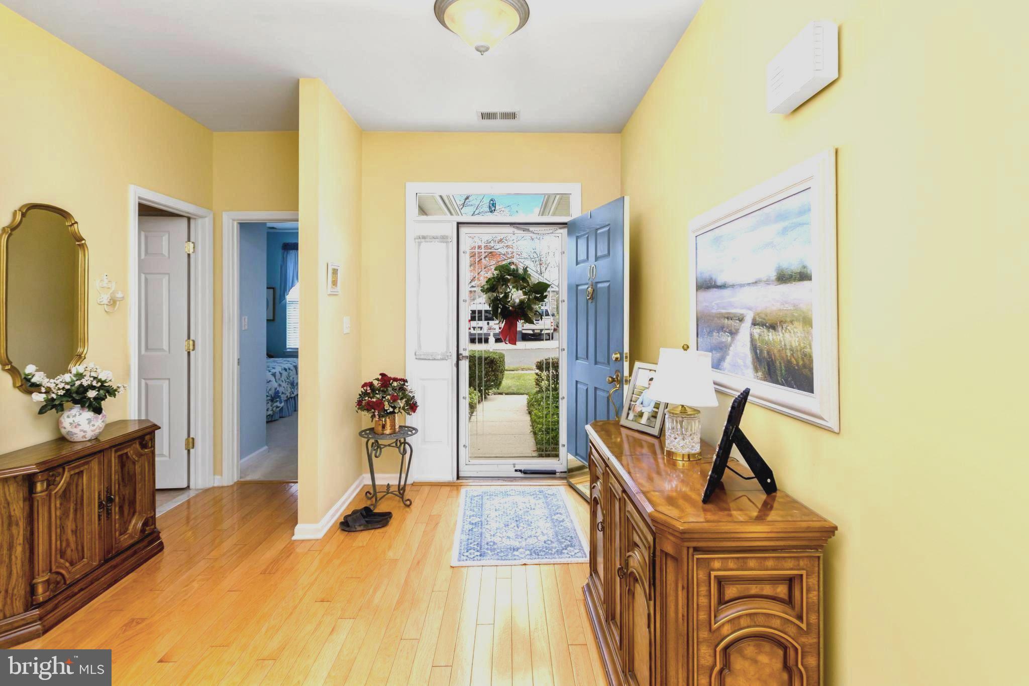 10 Powderhorn Way Allentown, NJ 08501 - Photo 7 of 44 a living room with furniture and a flat screen tv