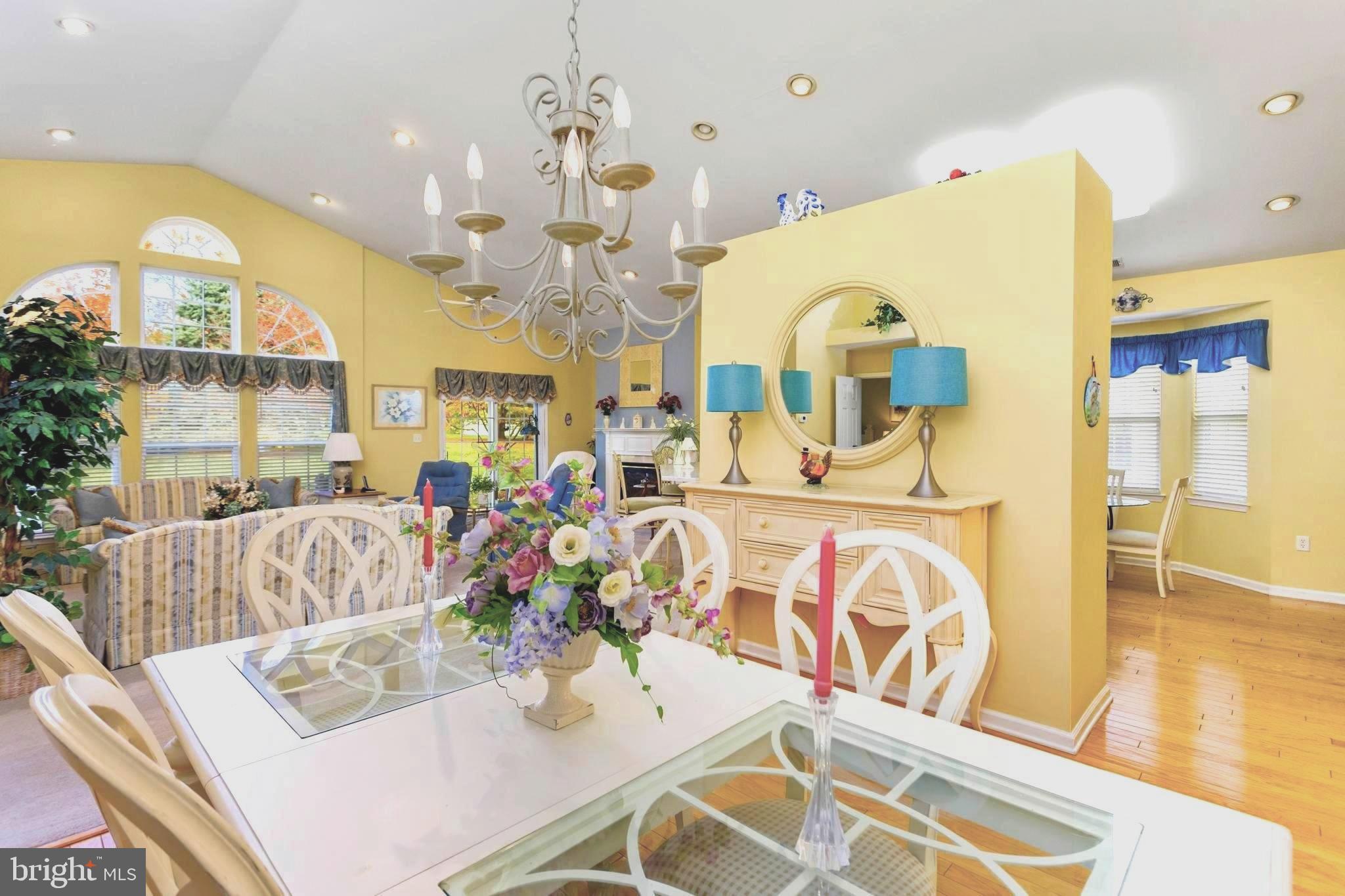 10 Powderhorn Way Allentown, NJ 08501 - Photo 9 of 44 a view of a dining room with furniture and a chandelier