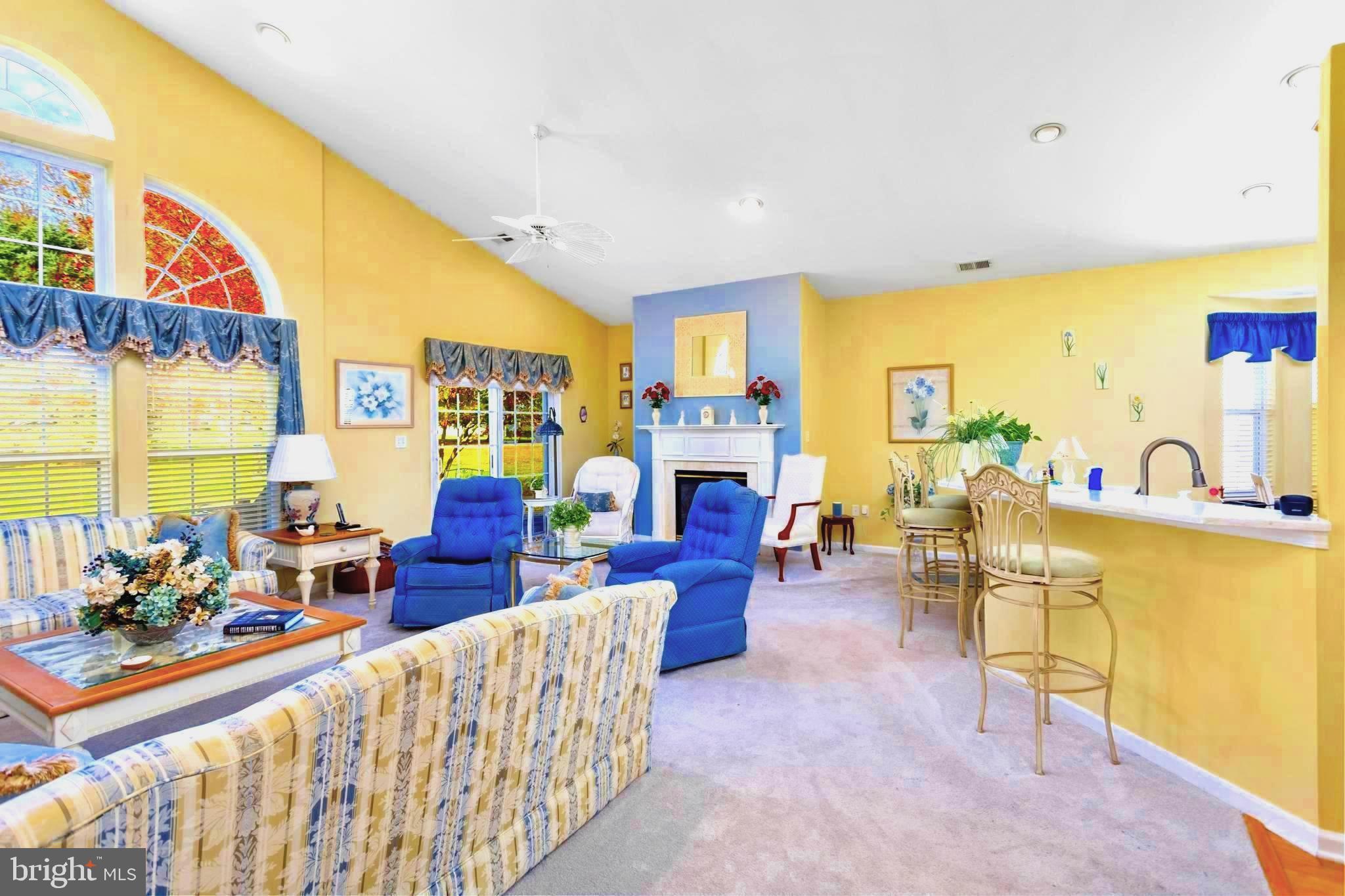 10 Powderhorn Way Allentown, NJ 08501 - Photo 10 of 44 a living room with fireplace furniture and a large window