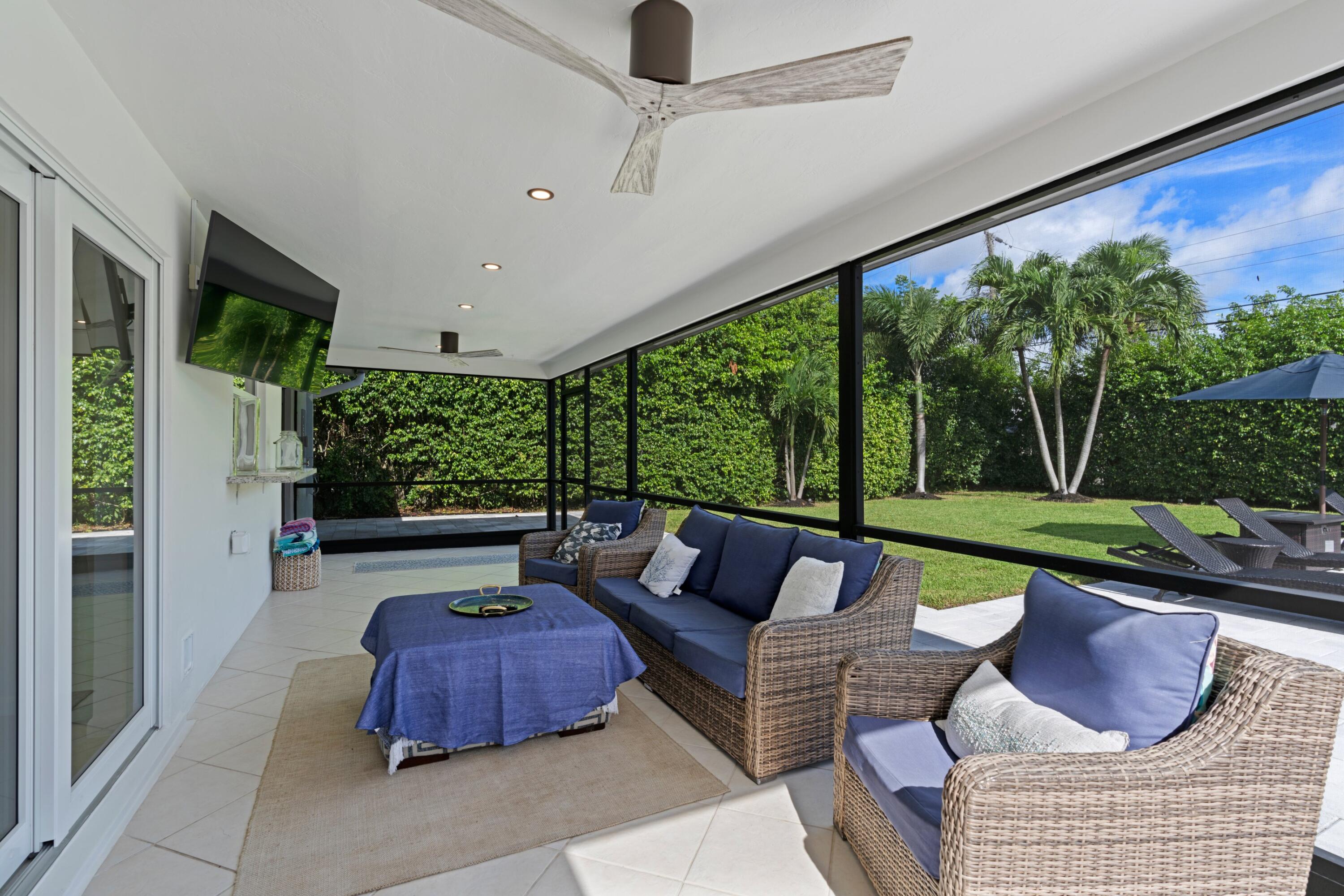 1093 Southwest 14th Street Boca Raton, FL 33486 - Photo 13 of 18 a outdoor living space with furniture and garden view