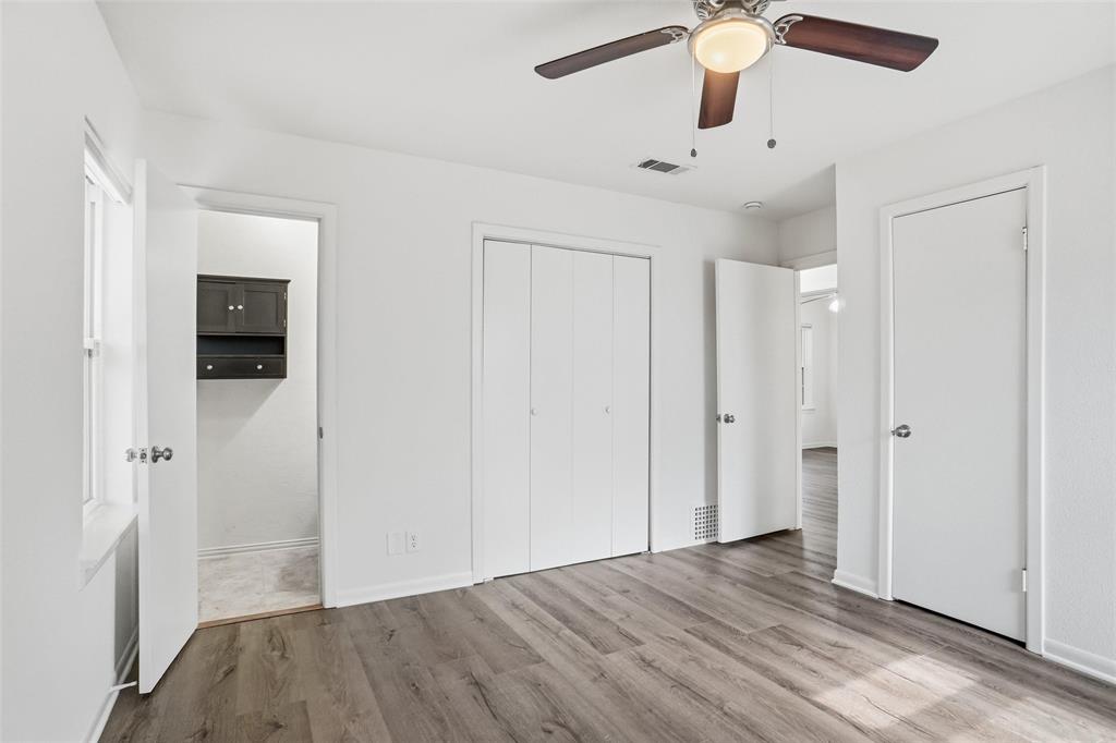 1236 Terrace Drive Grapevine, TX 76051 - Photo 15 of 25 wooden floor in an empty room with a window