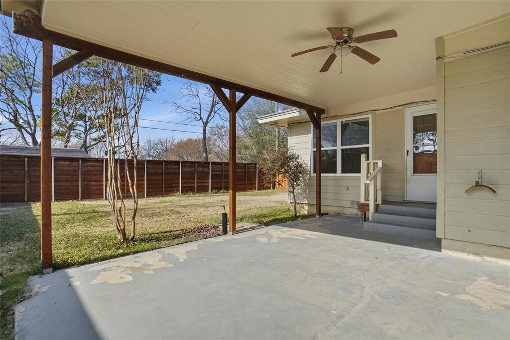 1236 Terrace Drive Grapevine, TX 76051 - Photo 22 of 25 a view of empty room with wooden floor and fence