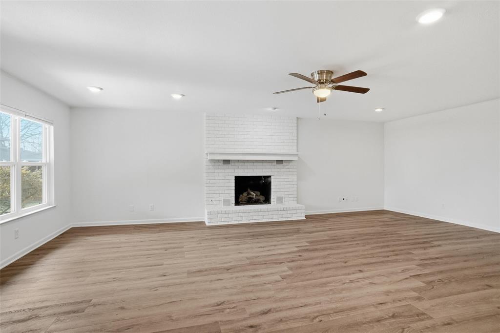 1236 Terrace Drive Grapevine, TX 76051 - Photo 10 of 25 an empty room with fan and windows