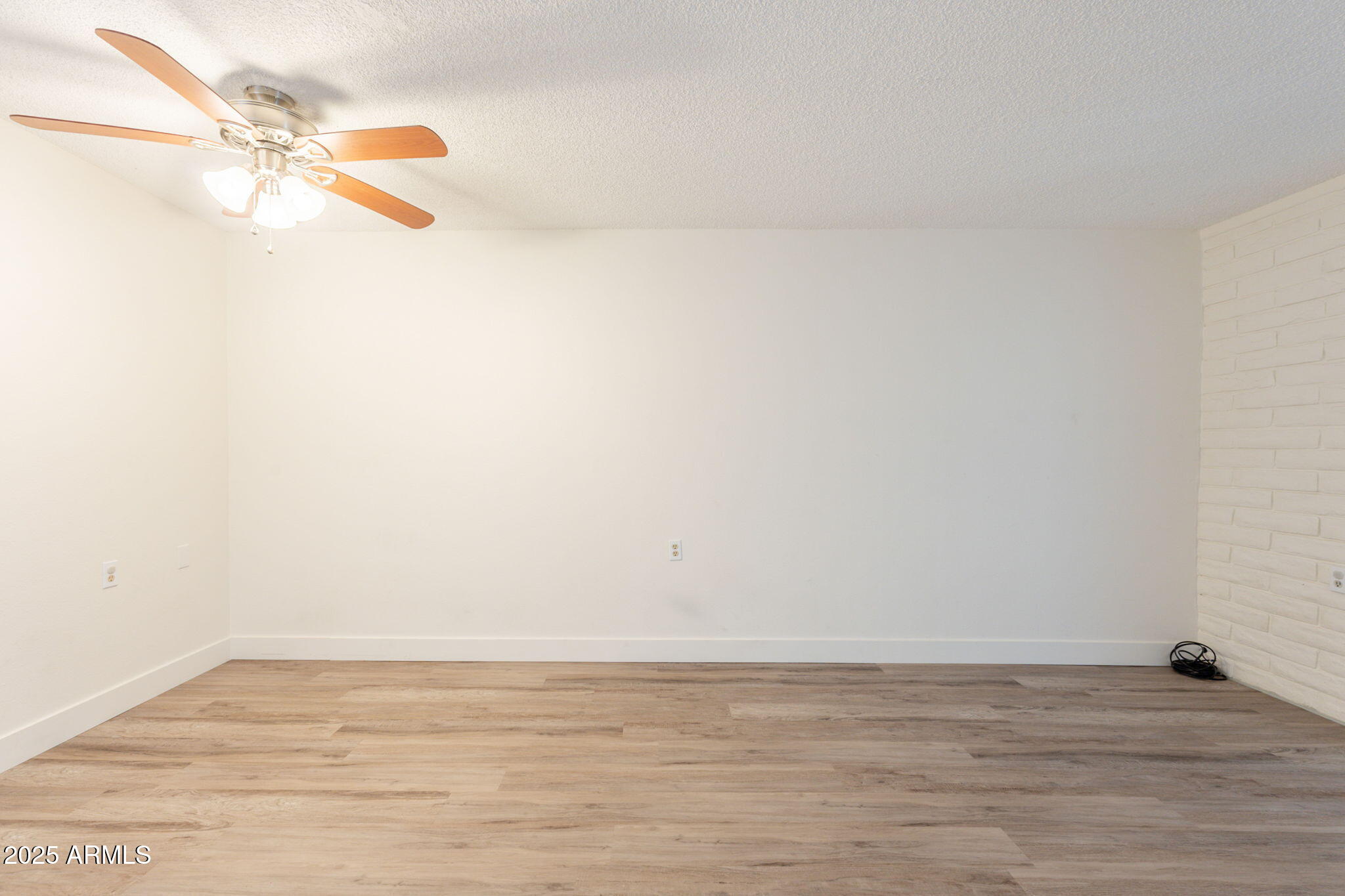 13001 North 113th Avenue, Unit 5 Youngtown, AZ 85363 - Photo 11 of 36 a view of a room with an empty space