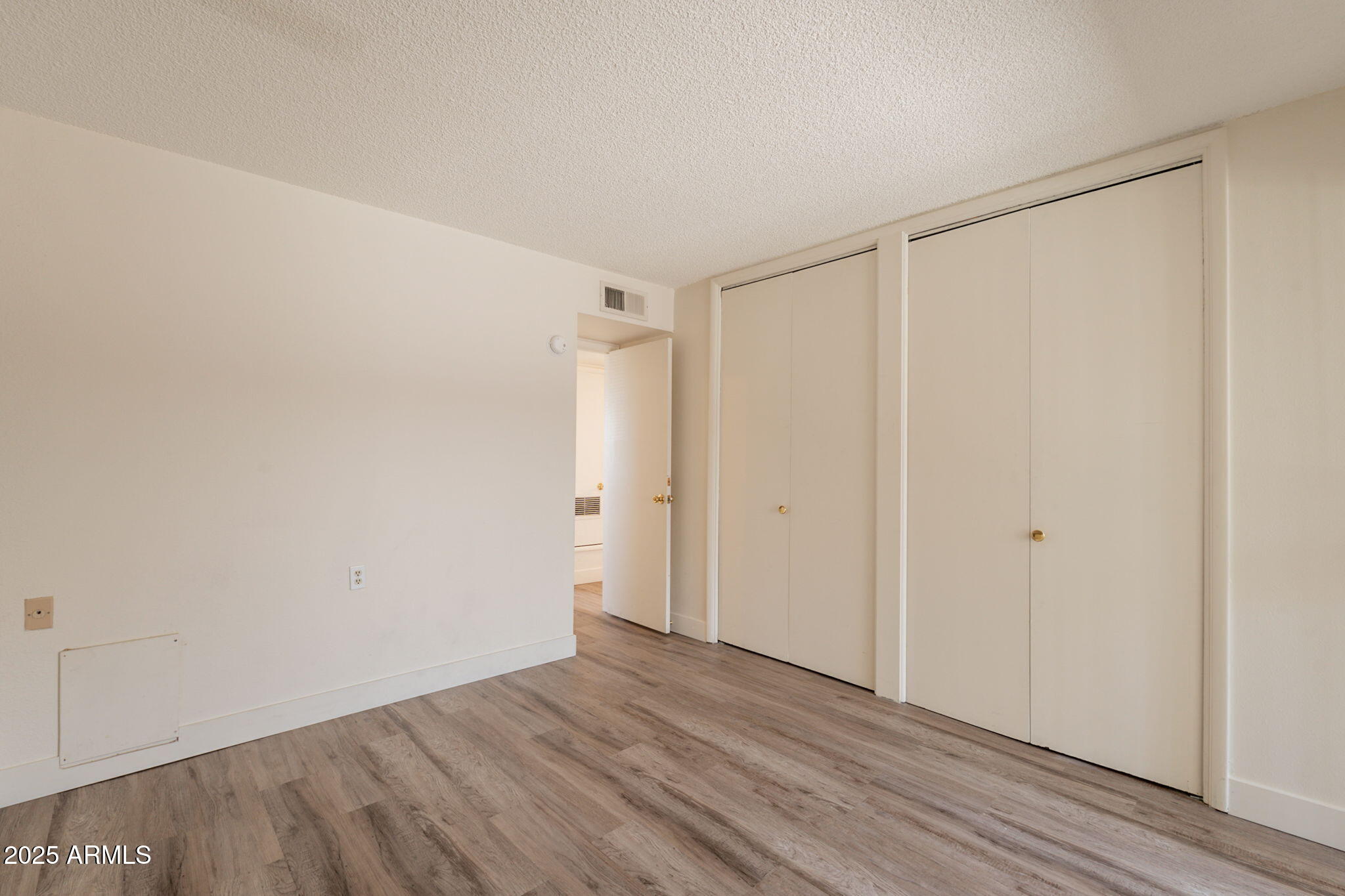 13001 North 113th Avenue, Unit 5 Youngtown, AZ 85363 - Photo 19 of 36 a view of an empty room