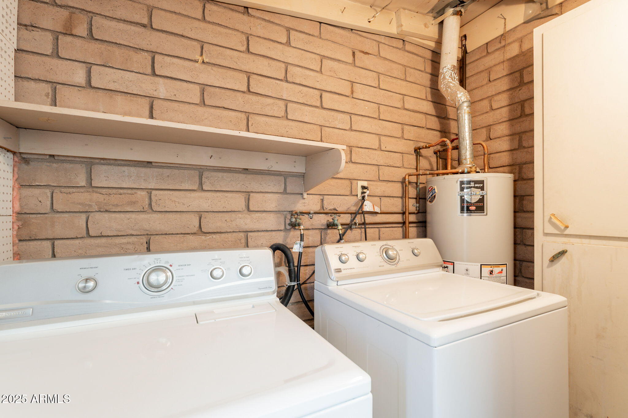 13001 North 113th Avenue, Unit 5 Youngtown, AZ 85363 - Photo 32 of 36 a utility room with dryer and washer