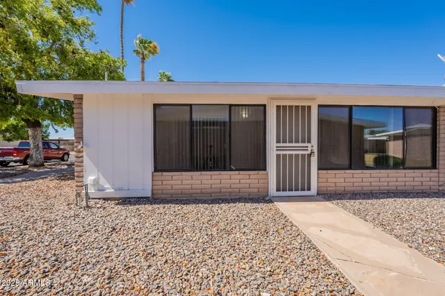 a view of entrance gate of the house