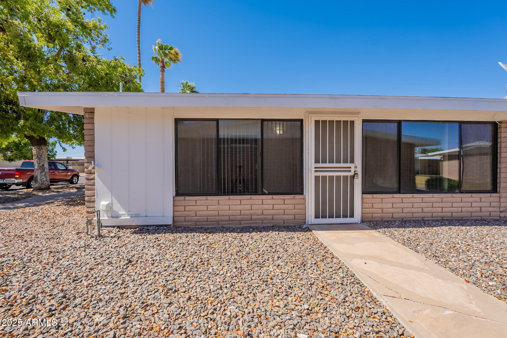 13001 North 113th Avenue, Unit 5 Youngtown, AZ 85363 - Photo 33 of 36 a view of entrance gate of the house
