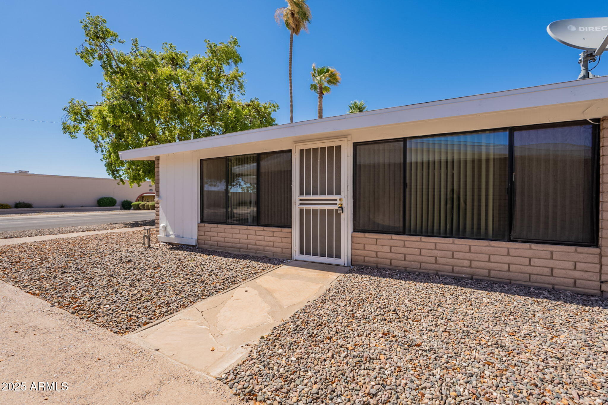 13001 North 113th Avenue, Unit 5 Youngtown, AZ 85363 - Photo 35 of 36 a front view of a house