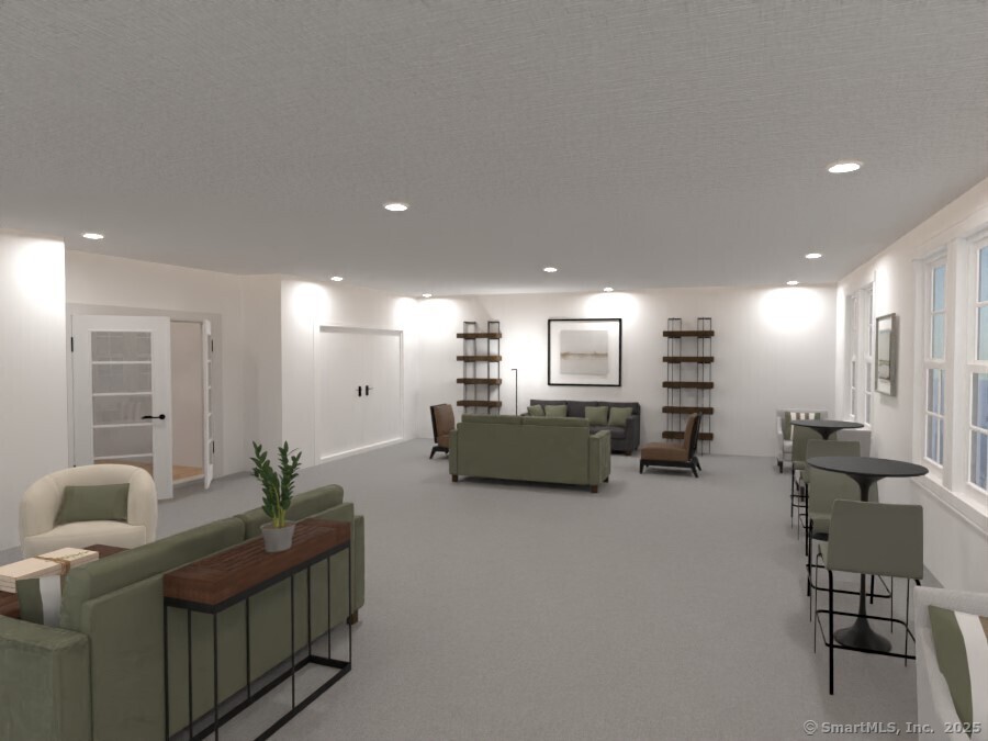 5 Cherry Brook Road, Unit 121 Canton, CT 06019 - Photo 7 of 10 a living room with furniture and a flat screen tv