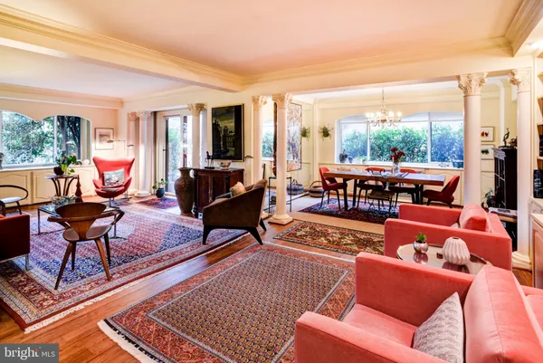 a living room with furniture and a rug