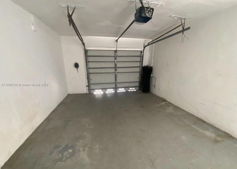 4308 Adams Street Hollywood, FL 33021 - Photo 18 of 21 a view of a garage