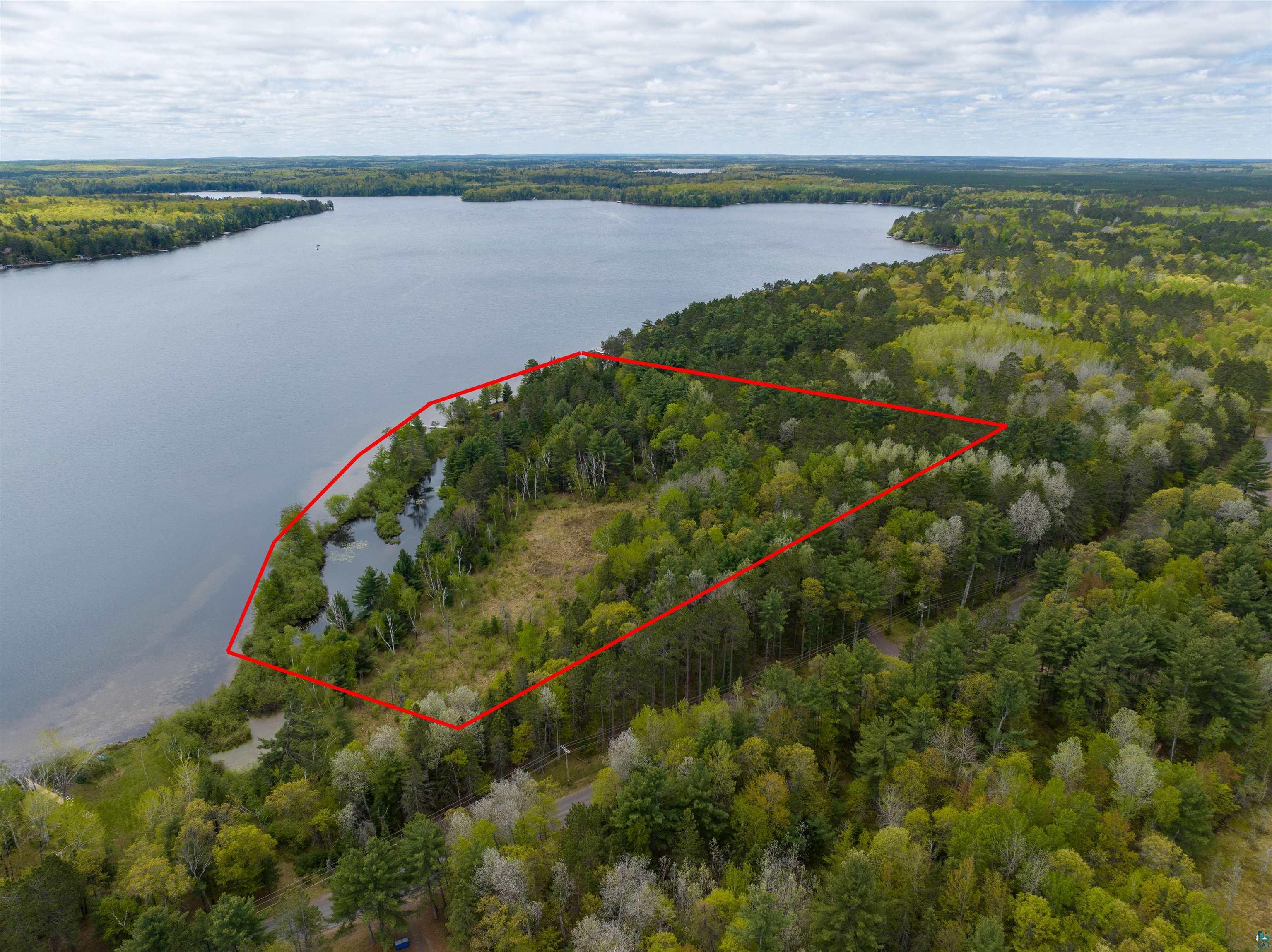 2775 Lake Road Barnes, WI 54873 - Photo 13 of 52 Aerial view of property and surrounding area featuring property boundaries highlighted and a large body of water